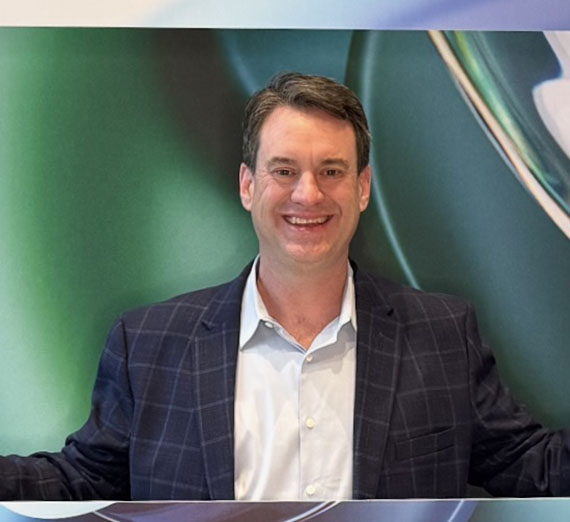 STCU President Ezra Eckhardt smiles into camera